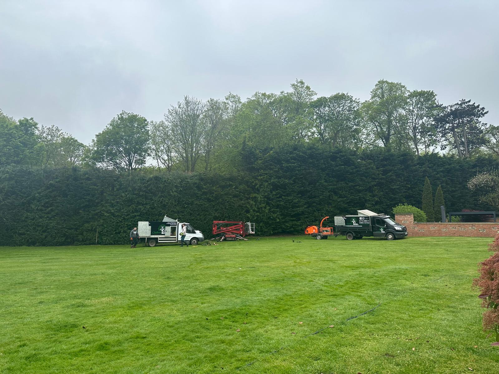 Crews setting up for large hedge cutting job